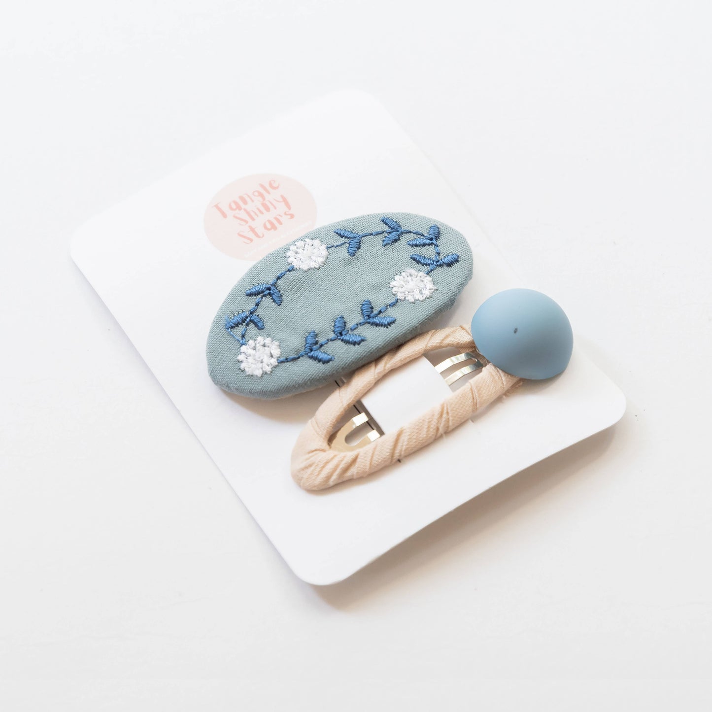 embroidered hair snap clips - blue and beige